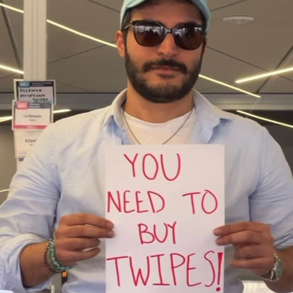 Social media post of a man holding a sign of Twipes